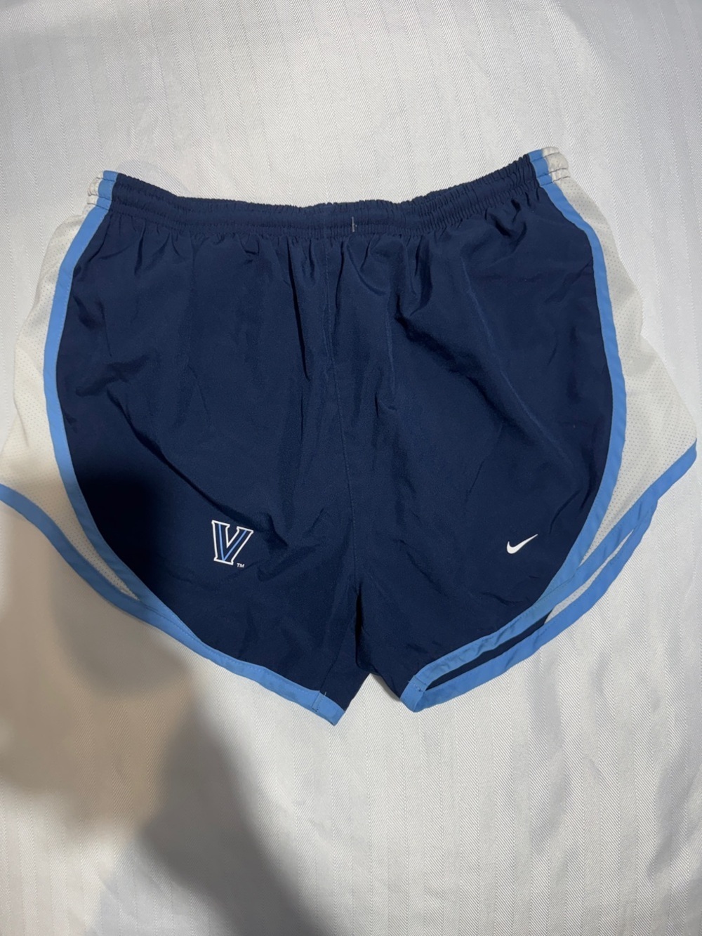Nike Women's Navy Shorts with Light Blue Trim